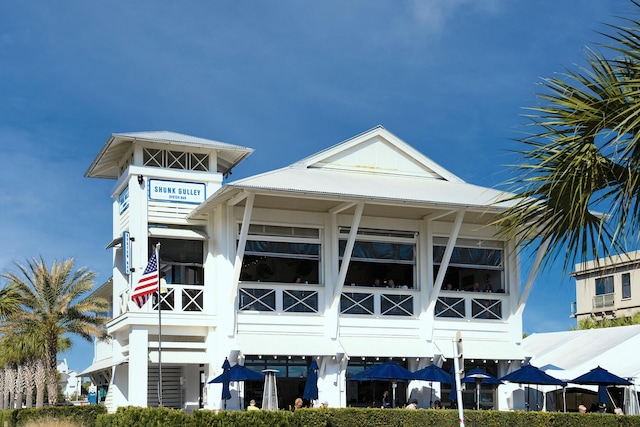 3986 W County Highway 30a Unit 231, Santa Rosa Beach, FL 32459 - view of front of house featuring a carport and a balcony