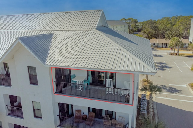3986 W County Highway 30a Unit 231, Santa Rosa Beach, FL 32459 - exterior space featuring metal roof and stucco siding