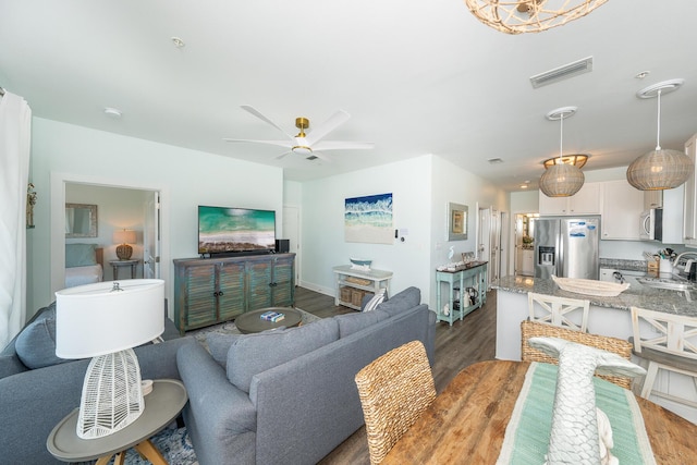 3986 W County Highway 30a Unit 231, Santa Rosa Beach, FL 32459 - living room featuring visible vents, dark wood finished floors, and a ceiling fan