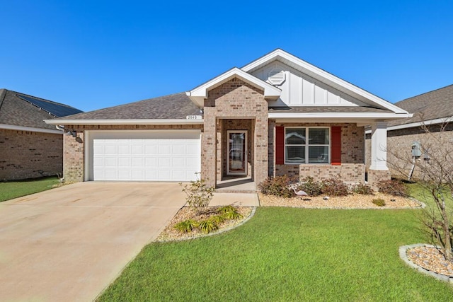 view of front facade featuring a garage and a front yard