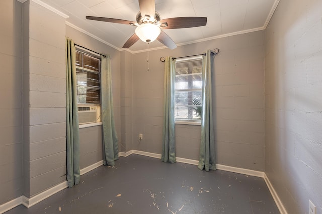 unfurnished room with cooling unit, concrete floors, a ceiling fan, ornamental molding, and concrete block wall