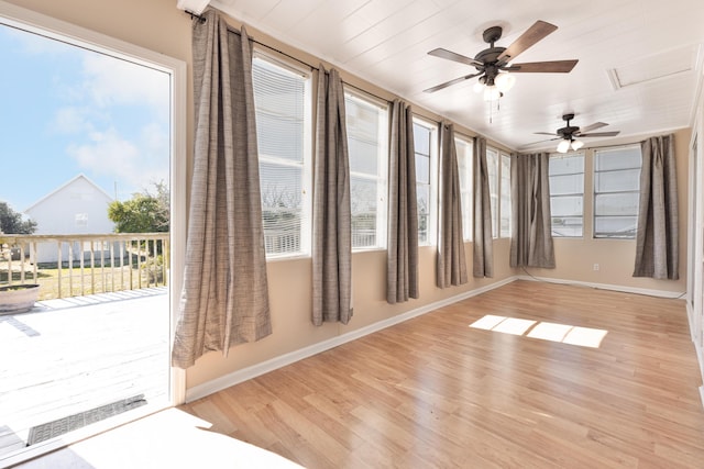 unfurnished sunroom featuring visible vents