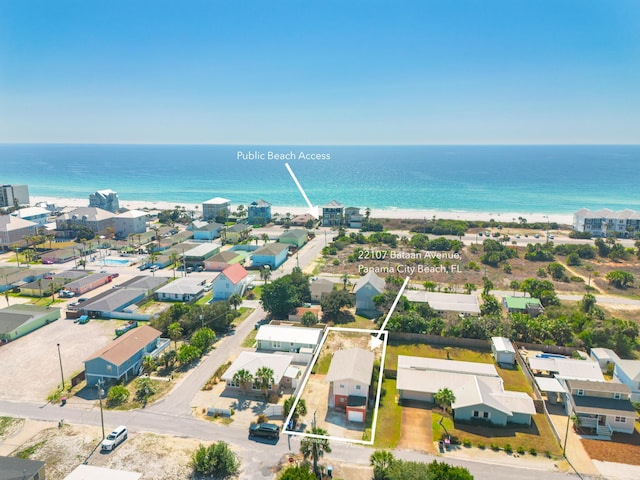 aerial view featuring a water view and a residential view