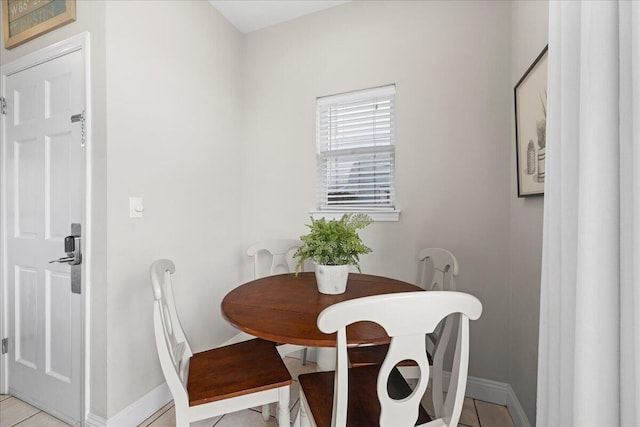 view of tiled dining space