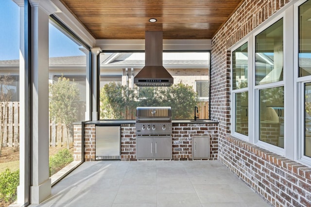 unfurnished sunroom featuring sink and wood ceiling