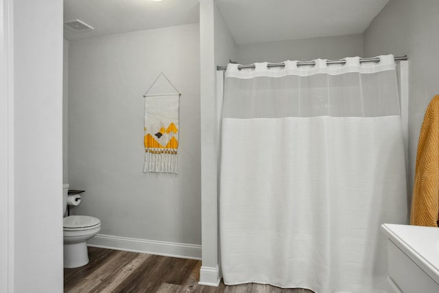 bathroom featuring hardwood / wood-style flooring