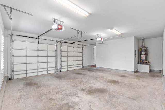 garage featuring a garage door opener and gas water heater