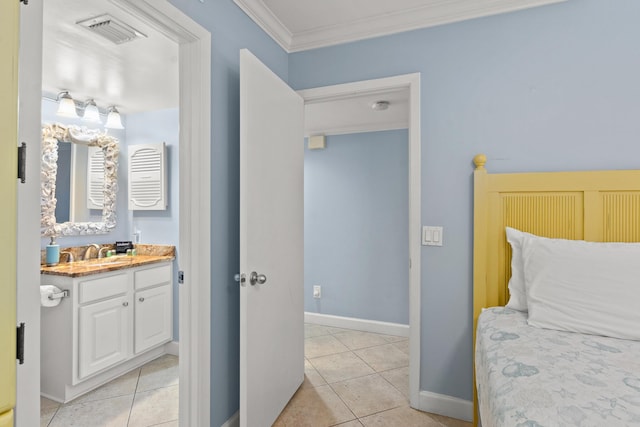 tiled bedroom with sink and crown molding