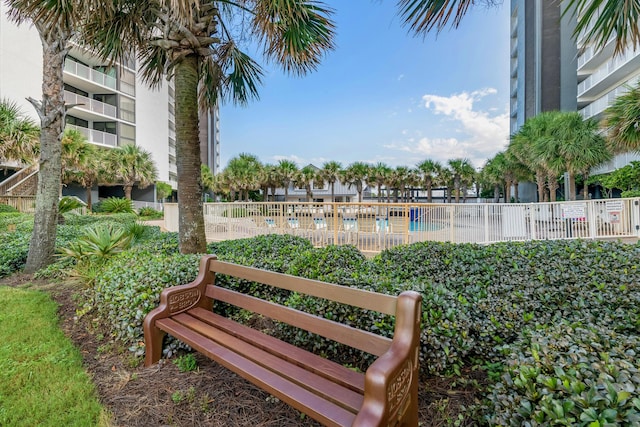 view of home's community featuring a pool