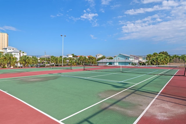 view of tennis court with basketball court