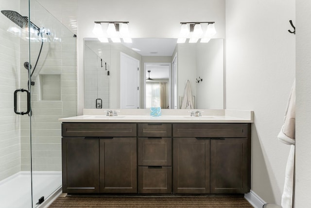 bathroom with vanity and an enclosed shower