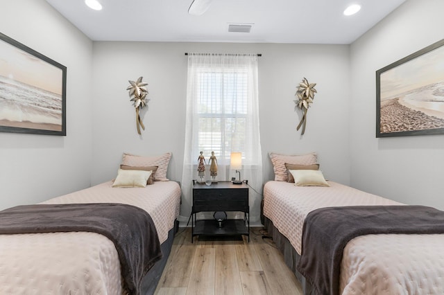 bedroom featuring light wood-type flooring