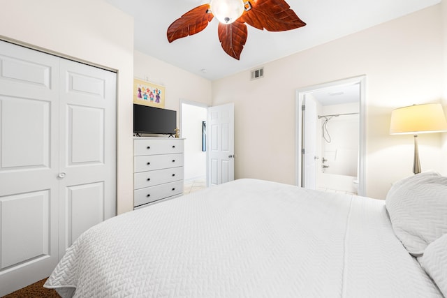 bedroom with connected bathroom, ceiling fan, and a closet