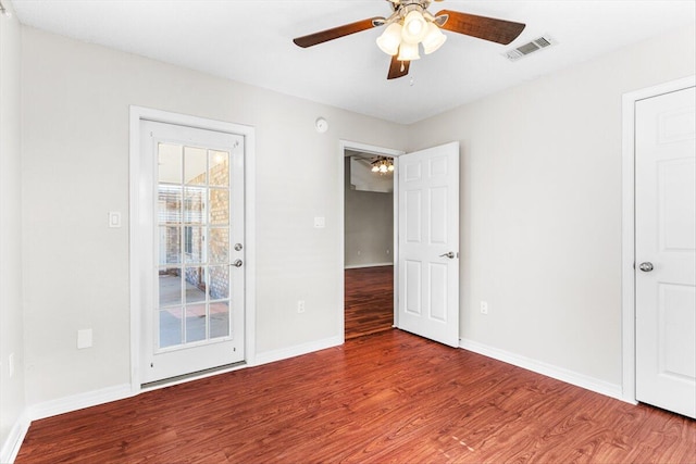 spare room featuring ceiling fan and wood-type flooring