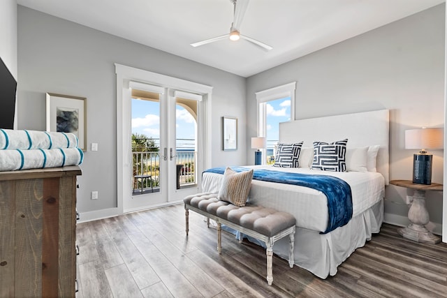 bedroom featuring french doors, ceiling fan, wood-type flooring, and access to exterior