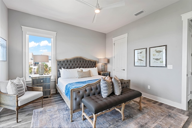 bedroom featuring dark wood-type flooring and ceiling fan