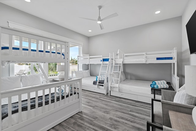 bedroom featuring hardwood / wood-style flooring and ceiling fan