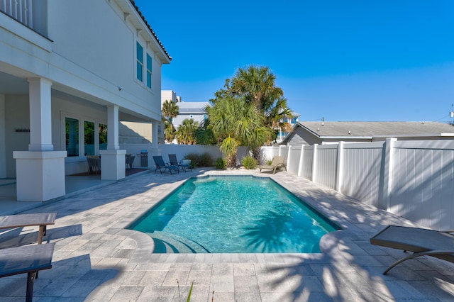 view of pool with a patio