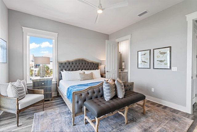 bedroom featuring dark wood-type flooring and ceiling fan