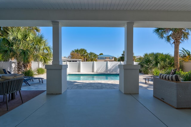 view of swimming pool with a patio area