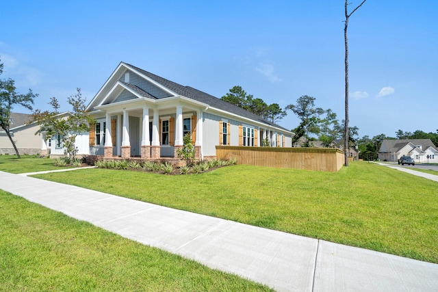 view of front facade with a porch and a front yard