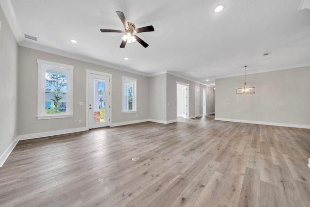 unfurnished living room featuring ceiling fan, crown molding, and light wood-type flooring