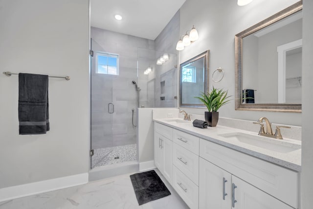 bathroom with vanity and an enclosed shower