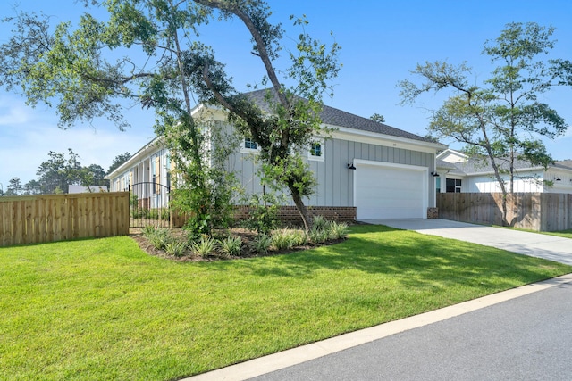 ranch-style house featuring an attached garage, board and batten siding, fence, driveway, and a front lawn