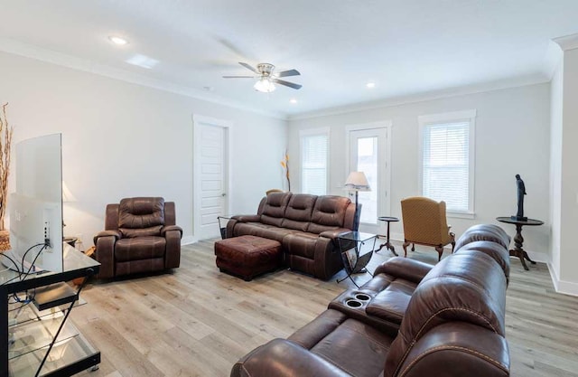 living room with recessed lighting, a ceiling fan, baseboards, light wood-style floors, and ornamental molding