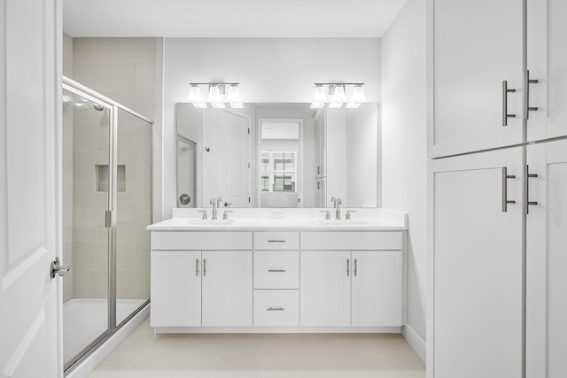 bathroom featuring vanity and walk in shower