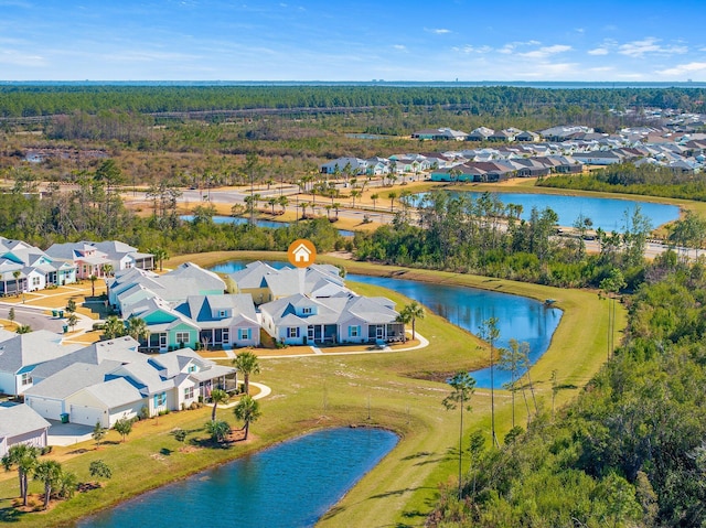 bird's eye view with a water view