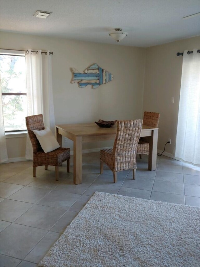 view of tiled dining area