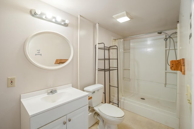 bathroom with a shower, vanity, and toilet