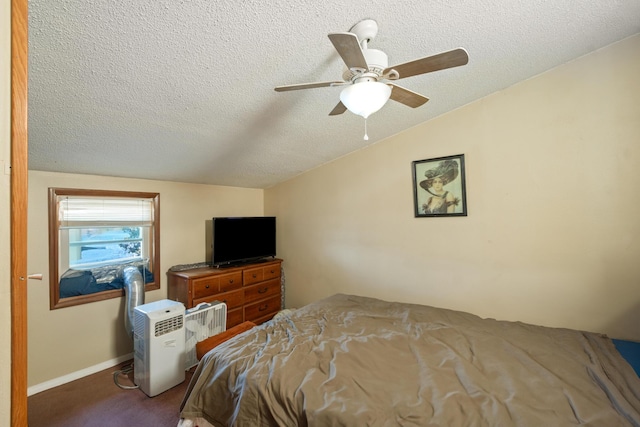 bedroom with dark carpet, a textured ceiling, and ceiling fan