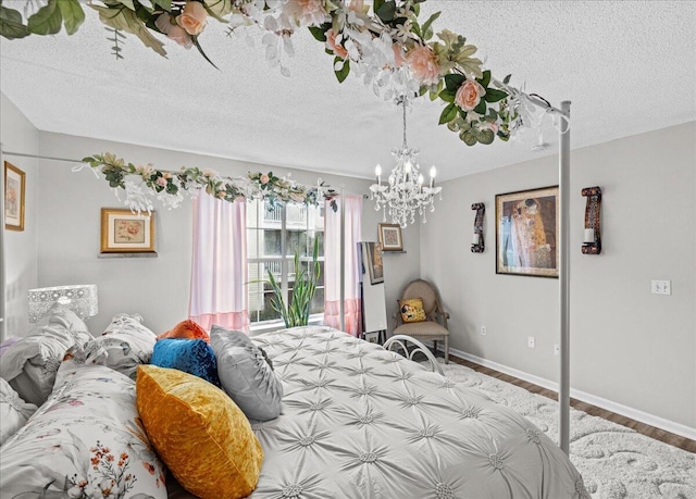 unfurnished bedroom with wood-type flooring and a textured ceiling