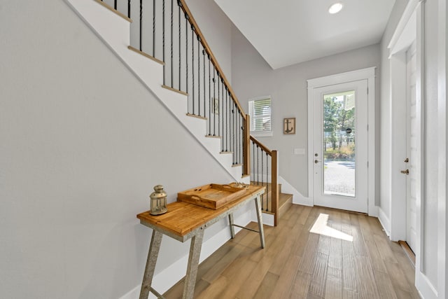 entryway with light hardwood / wood-style floors