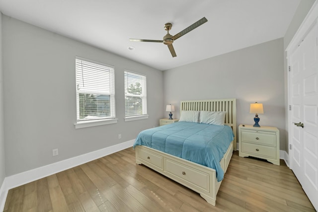 bedroom featuring ceiling fan and light hardwood / wood-style floors