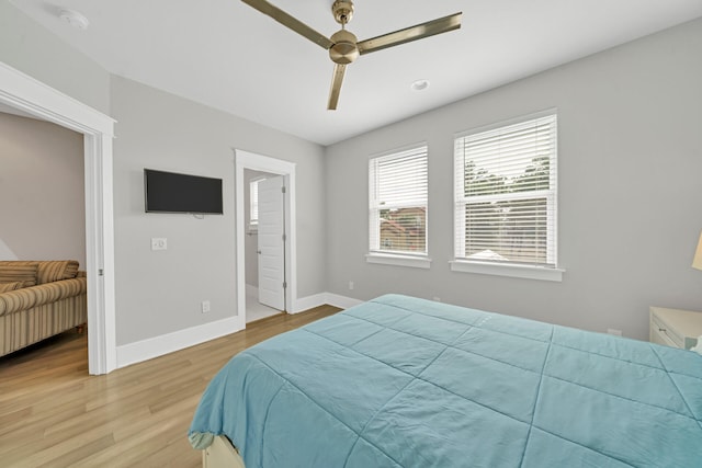 bedroom featuring light wood-type flooring and ceiling fan