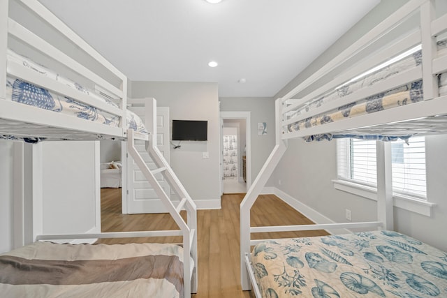 bedroom featuring wood-type flooring