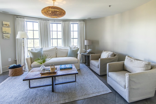 tiled living room with plenty of natural light