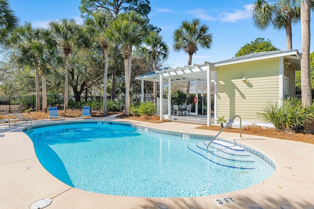 view of swimming pool with a pergola and a patio area