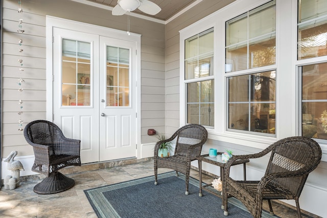 exterior space featuring ceiling fan