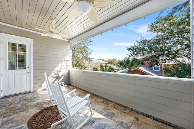 balcony featuring ceiling fan