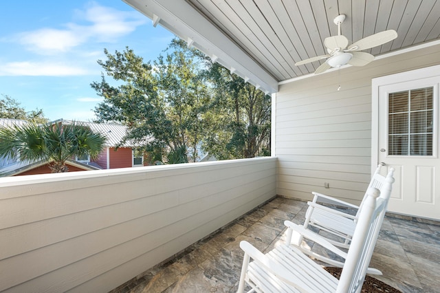 balcony featuring ceiling fan