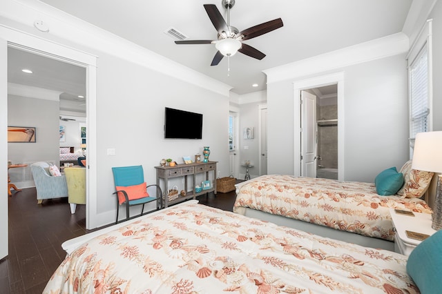 bedroom with connected bathroom, crown molding, dark hardwood / wood-style floors, and ceiling fan