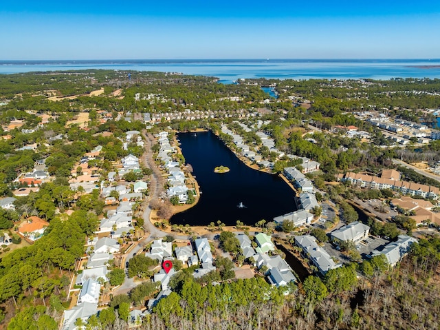 drone / aerial view with a water view