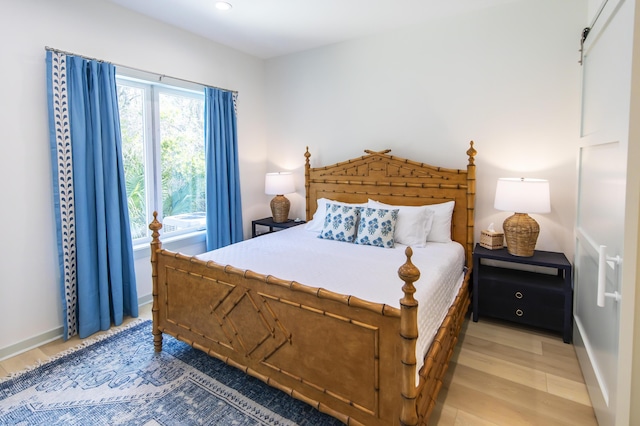 bedroom featuring light hardwood / wood-style flooring