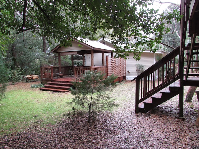 view of yard with a gazebo and a deck