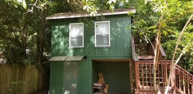 view of home's exterior featuring an outbuilding