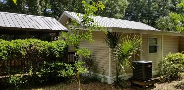 view of home's exterior featuring central AC